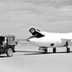 The jet-powered Skyrocket is towed across the dry lake bed at Edwards Air Force Base. Note the intakes for the air-breathing jet. (NASA)